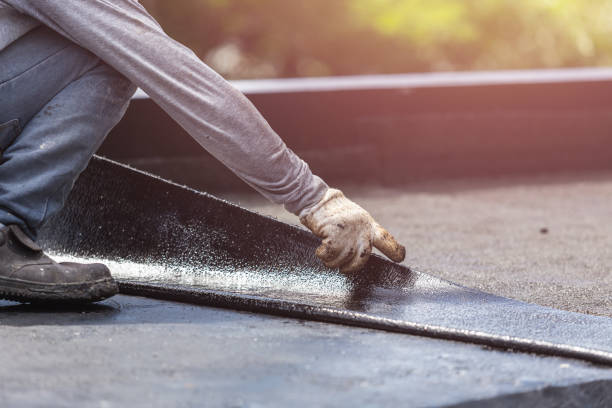 Professional Waterproofing technician working in McBain, MI